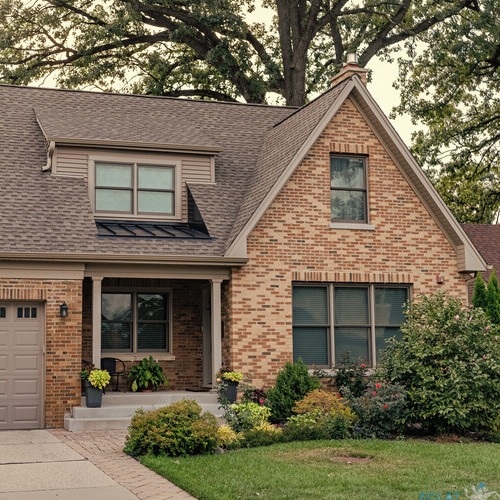 Suburban neighborhood. Private family home architecture. House exterior. Private house in suburban area. Suburban house architecture. Suburb exterior with private housing. Private driveway