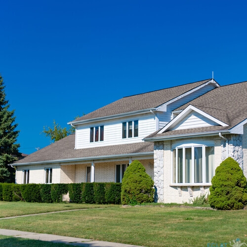 Neighborhood architecture. Property in neighborhood. Residential property house. Residence architecture. Suburban neighborhood. Suburban house architecture. Private house. Urban housing with a shingle roof