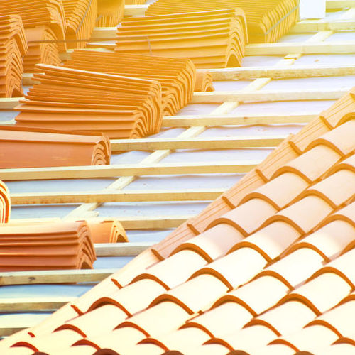 A Clay Roof Being Installed.