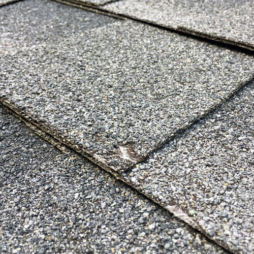 A Hail-Damaged Shingle.