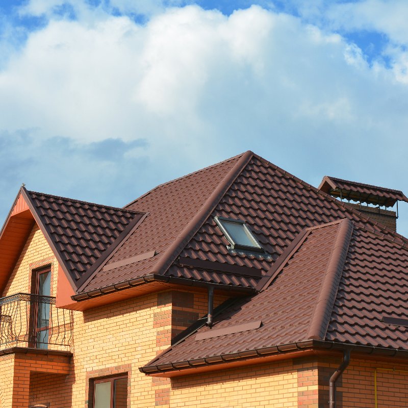 home with a reddish-brown tile roof