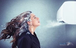 A Woman Stands in Front of Icy Air Conditioning