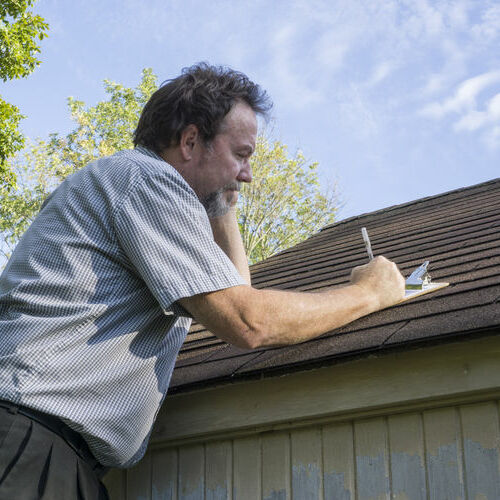 inspecting roof for hail damage repair needs