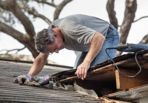 Examining Roof System for Leaks 